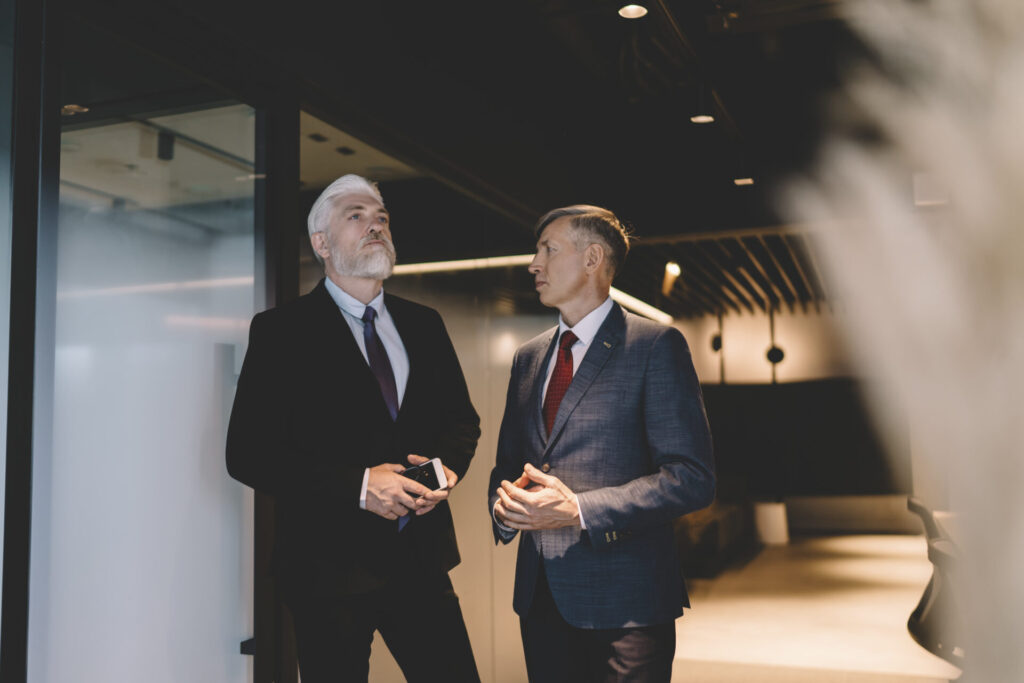 Landlord and letting agent discussing complaint handling and compliance