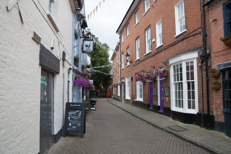 historic Wimborne town centre street with period properties and local shops