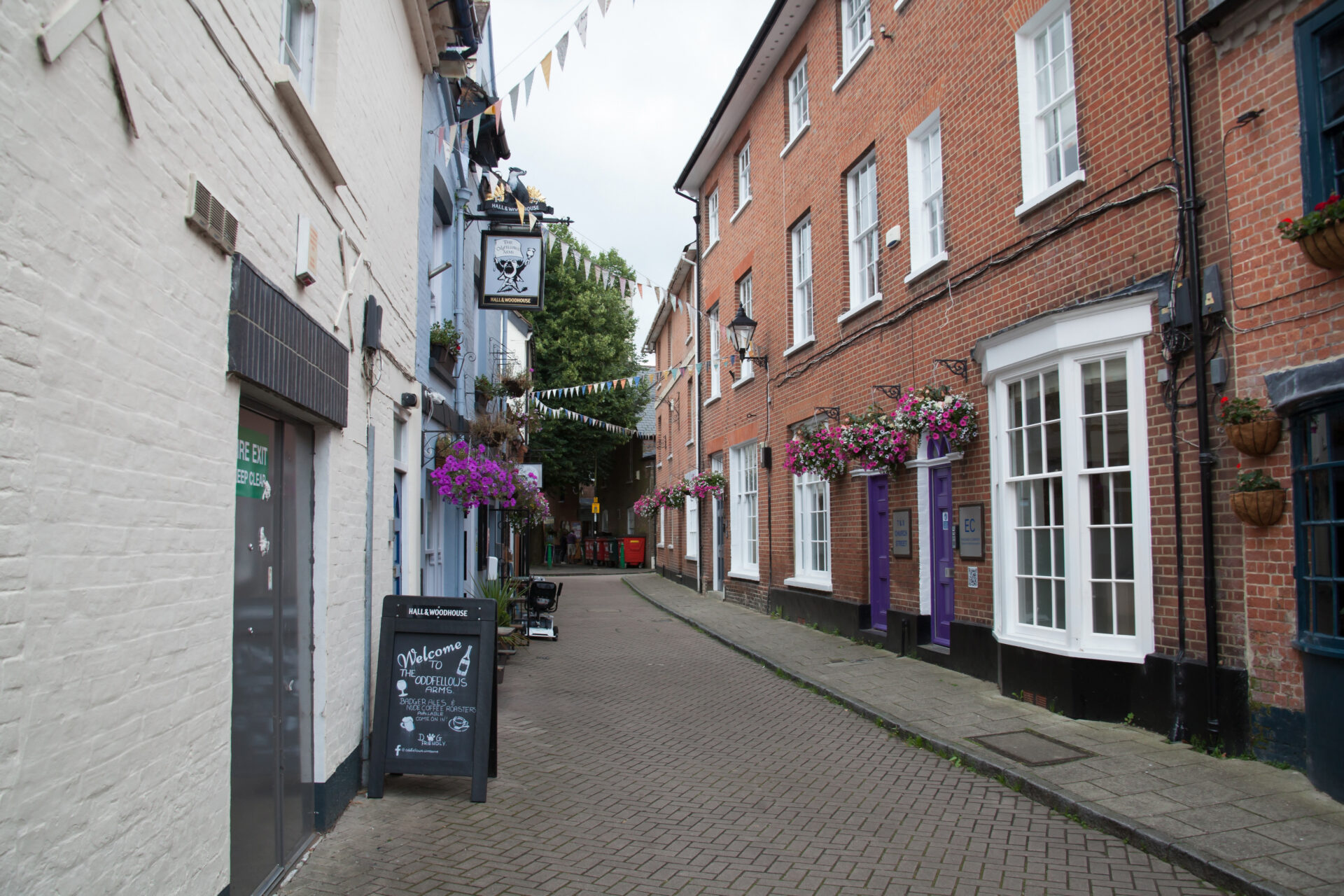 historic Wimborne town centre street with period properties and local shops