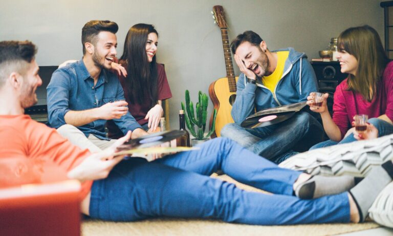 Students relaxing together in shared accommodation, representing Leicester student lets, HMO demand and landlord investment opportunities.
