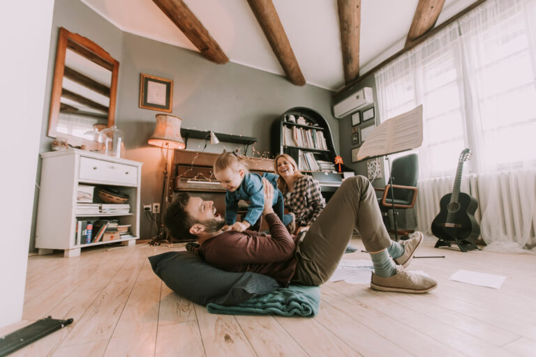 Family enjoying time together at home in Colehill